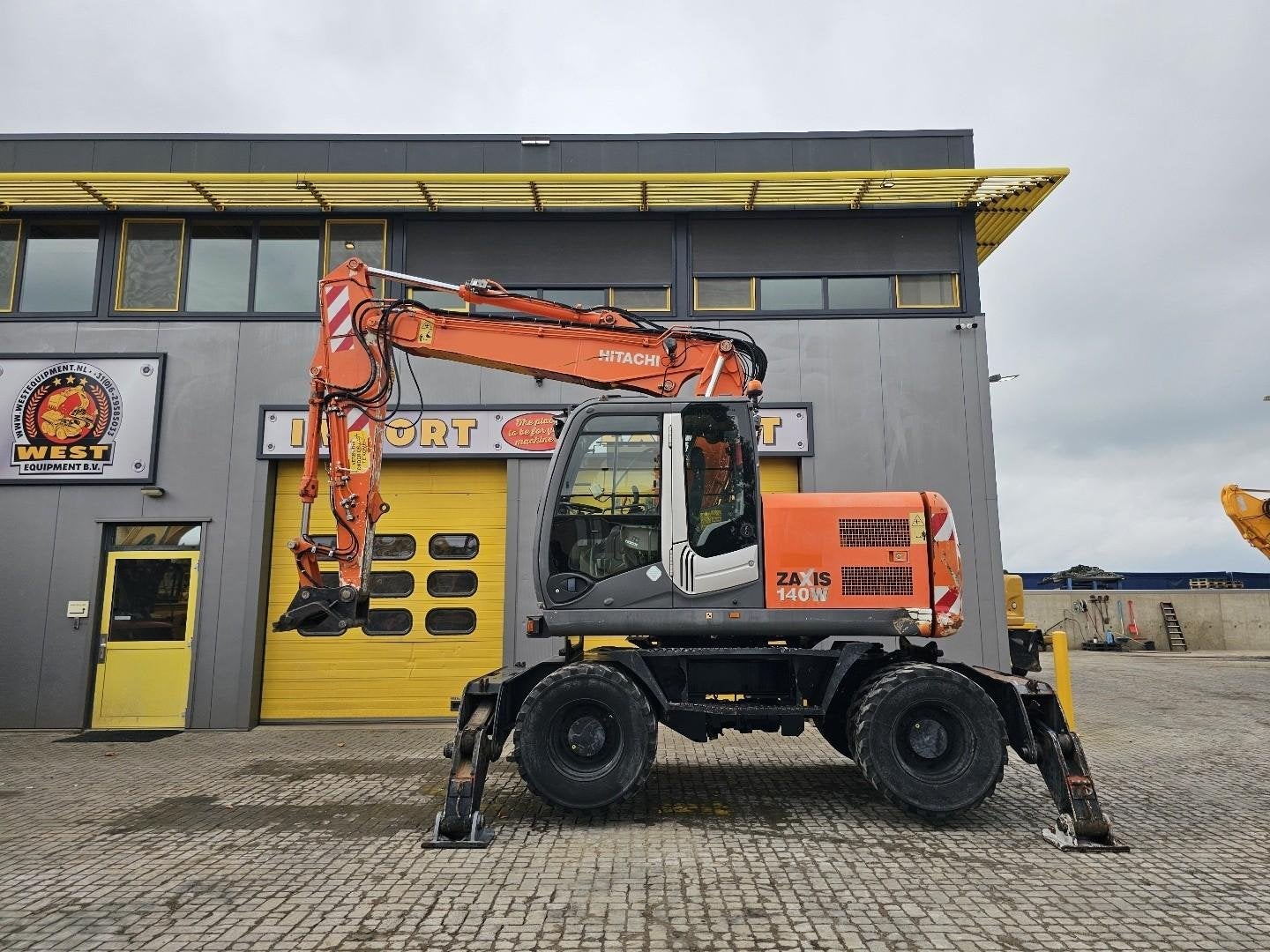 Hitachi ZX140W-3 WE1784, Excavatrice