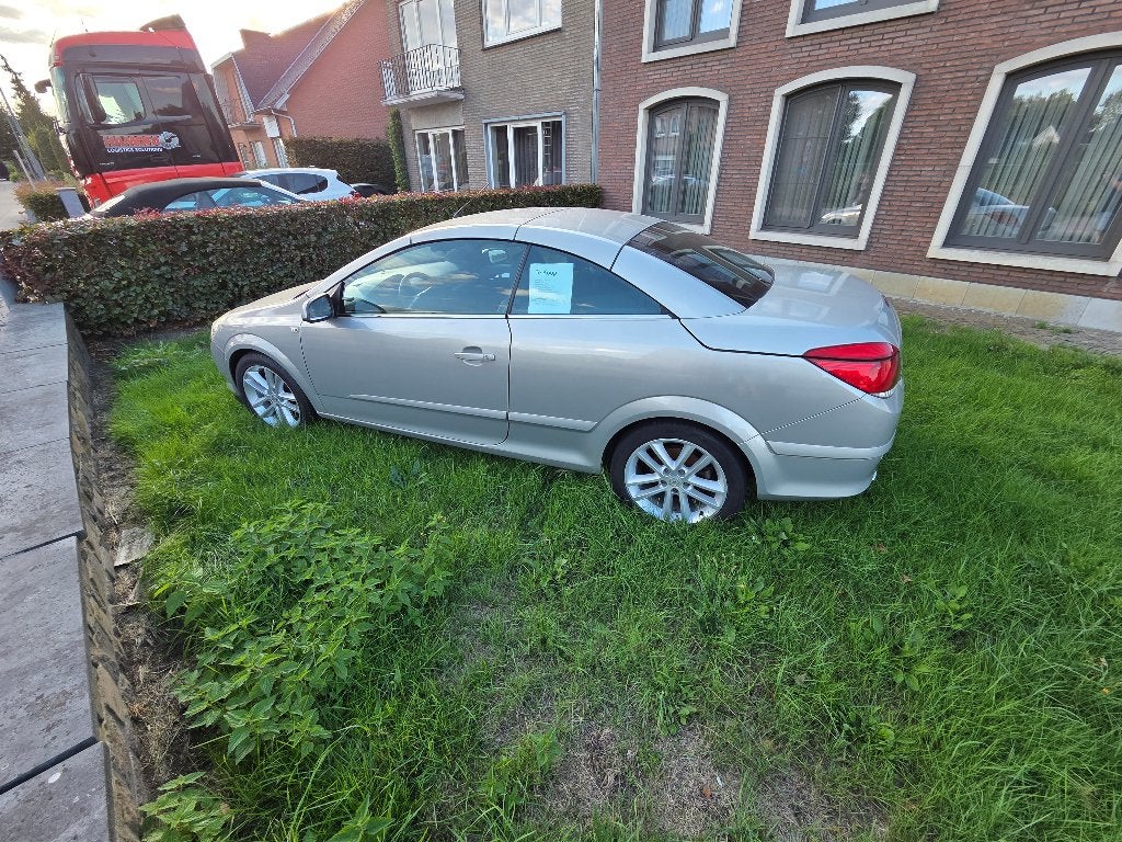 Opel Astra Twintop 1.6 Benzine, Autos, Système audio, Cabriolet, Boîte manuelle, Autres couleurs
