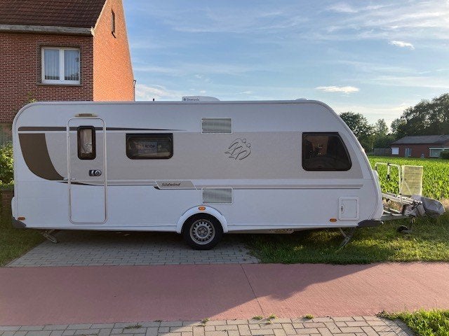 Te koop: Zéér volledige Knaus Sudwind 580fsk, Caravans en Kamperen, Caravans, Stapelbed, Kachel, 7 tot 8 meter, Treinzit