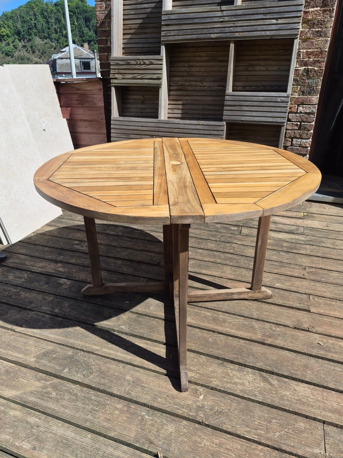 Table ronde en teck pliable, Enlèvement