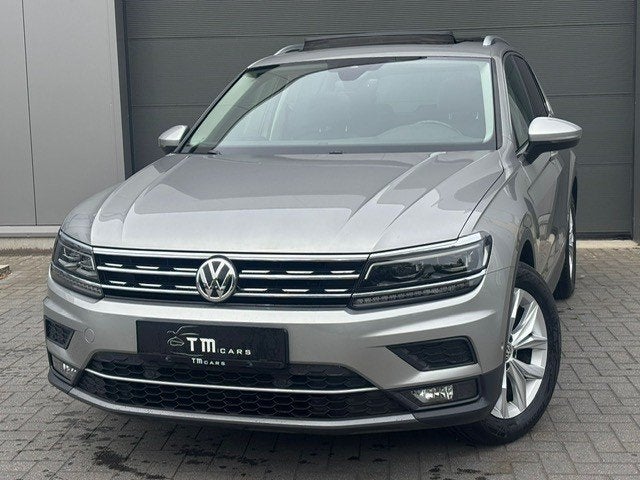 VW Tiguan Highline benzine automaat pano dak, Auto's, Volkswagen, Stof, 4 cilinders, Beige, 5 zetels