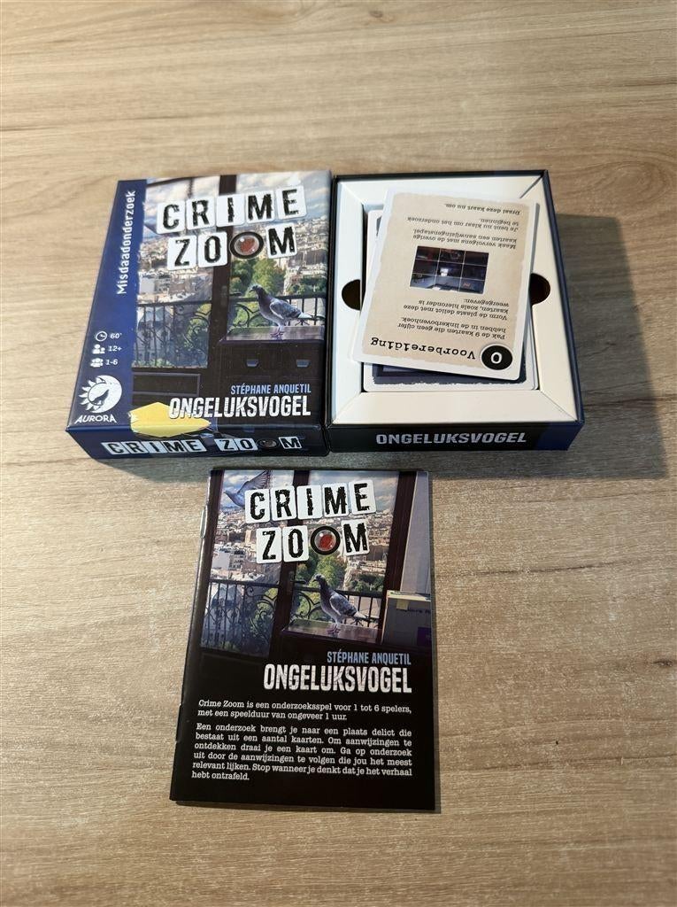 Crime zoom - ongeluksvogel - s6429, Hobby en Vrije tijd, Gezelschapsspellen | Bordspellen, Verzenden, Zo goed als nieuw