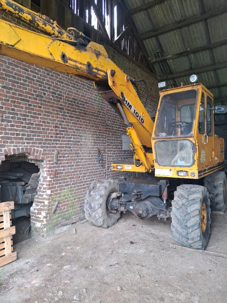 Pelle sur pneus, Enlèvement, Grue