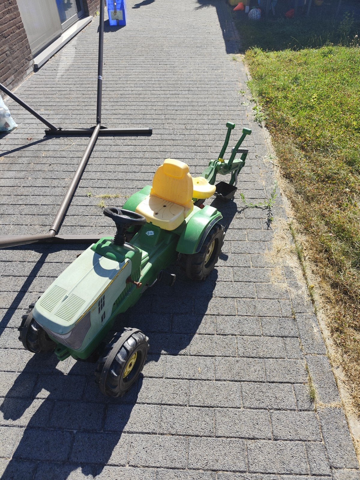 John dear tractor met graafmachine, Ophalen