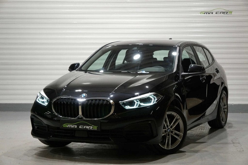 BMW 1 Serie 118 118iA Benzine Auto-Navi-Airco-PDC-Cam-Garant, Auto's, 1 Reeks, Gebruikt, Zwart, 136 pk