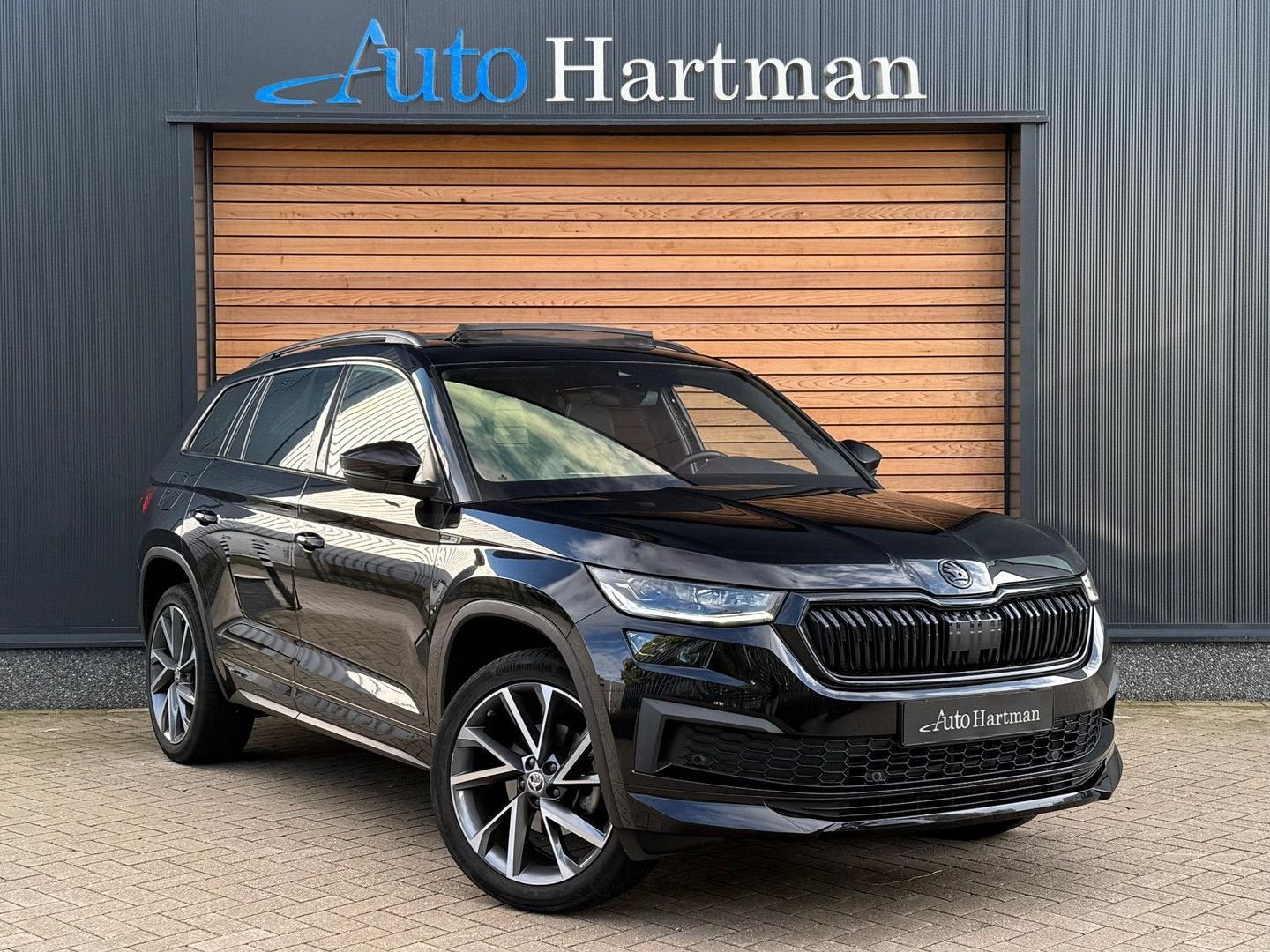Skoda Kodiaq 1.5 TSI Sportline Business SPORTSTOELEN|TREKHAA, Auto's, Automaat, 164 g/km, Zwart, Bedrijf