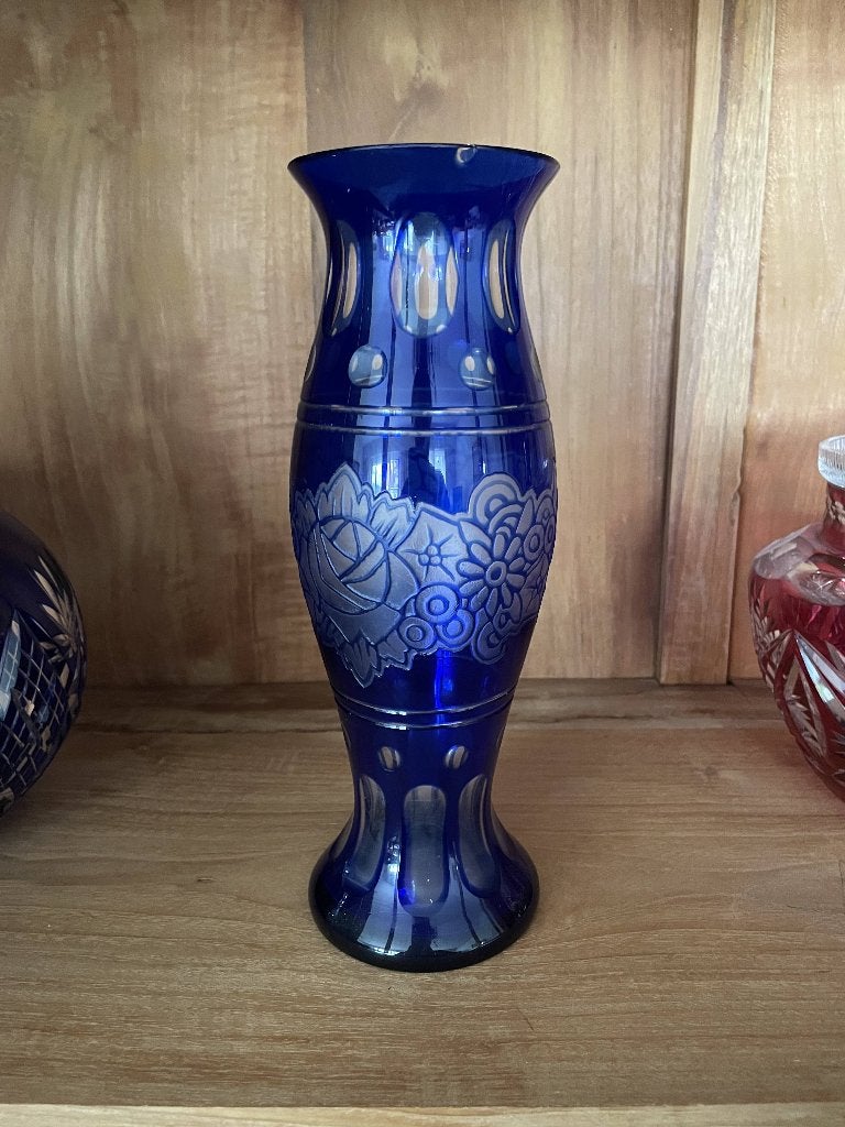 Antiek blauw vaasje, Ophalen