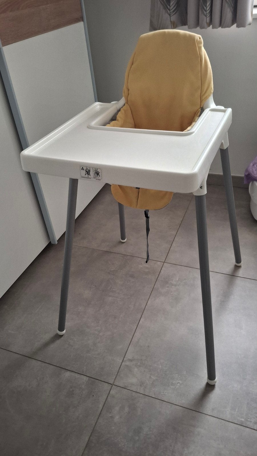 Kinderstoel met binnenbekleding, Ophalen