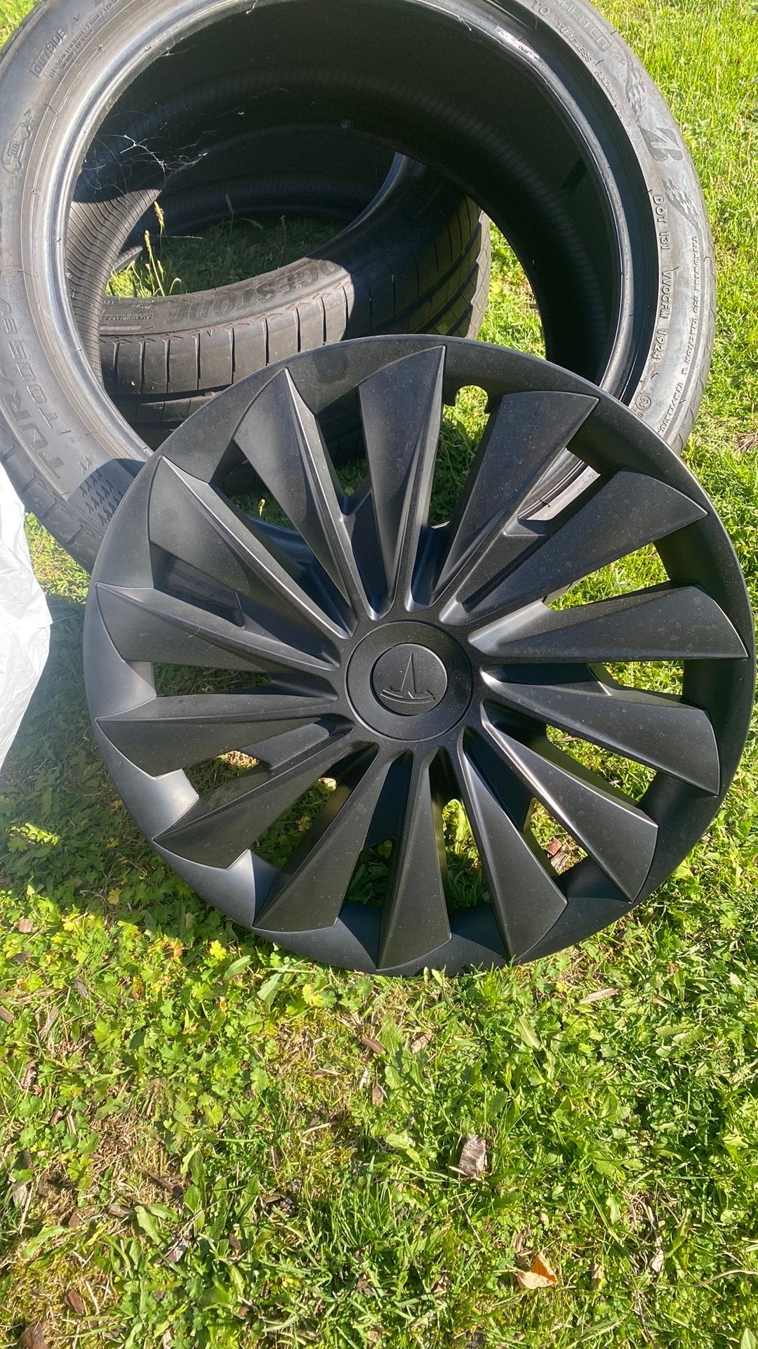 Wieldeksels tesla model 3, Ophalen