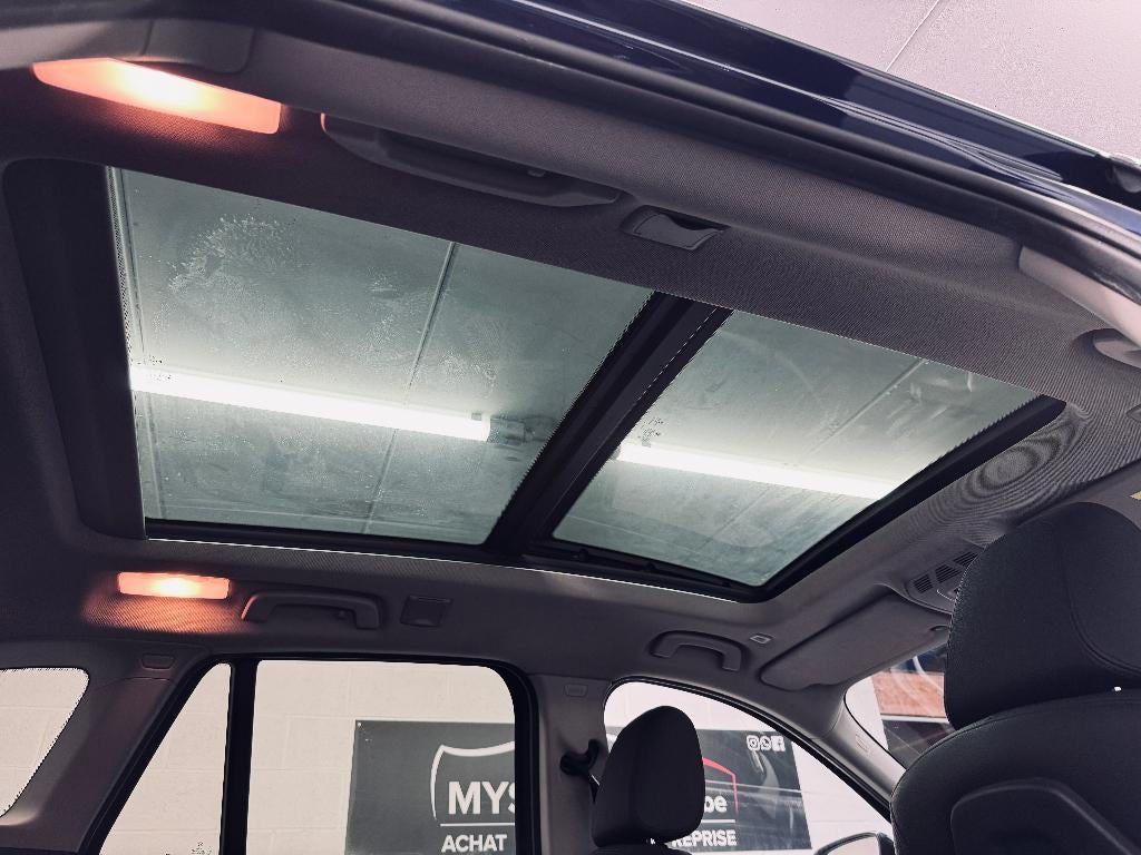 BMW X1, leer, panodak, 1 jaar garantie, Auto's, BMW, Testrit aan huis, 4 cilinders, Blauw, 2020 kg