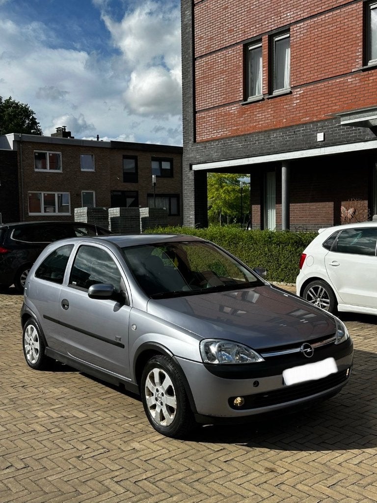 Opel Corsa 1.2 Benzine - 98000km - AIRCO!, Autos, Opel, Argent ou Gris, Achat, Noir, 5 places