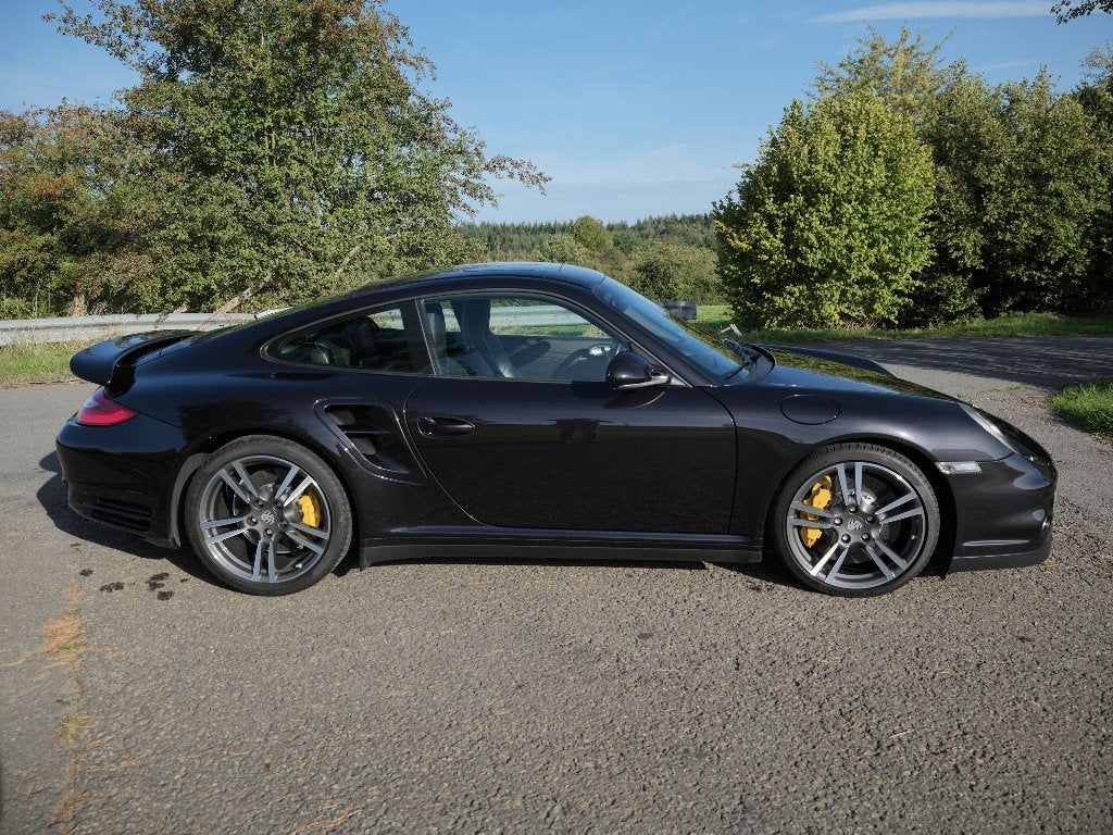 Porsche 911 (997.2) Turbo PDK 60.000 km PCCB Akrapovic, Auto's, Automaat, Zwart, Zwart, Leder