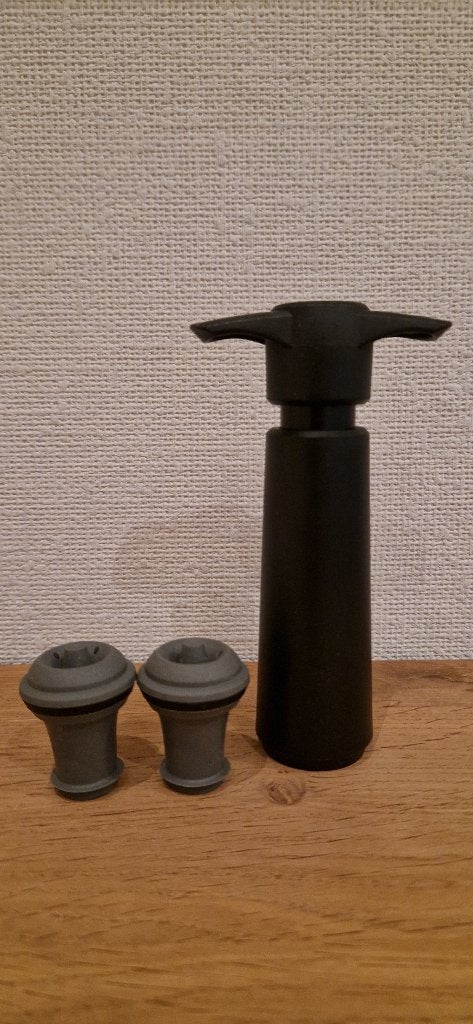 Vacuumtrekker met twee flessenstops voor wijn, Ophalen