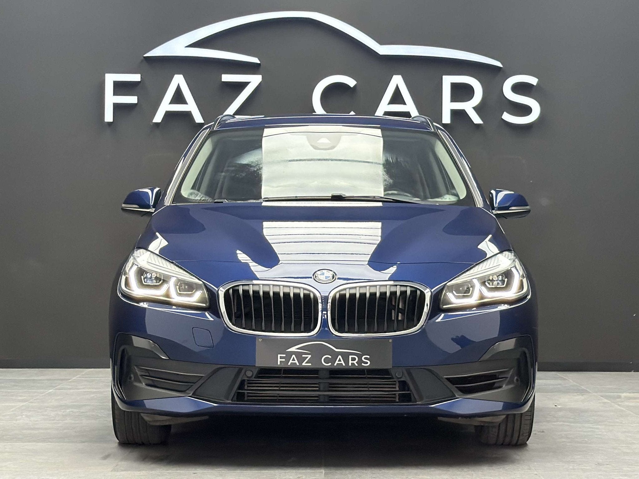 BMW 2 Serie 218 iA Gran Tourer * 1ER PROP + CUIR + GPS + GAR, Gebruikt, Blauw, Leder, Bedrijf