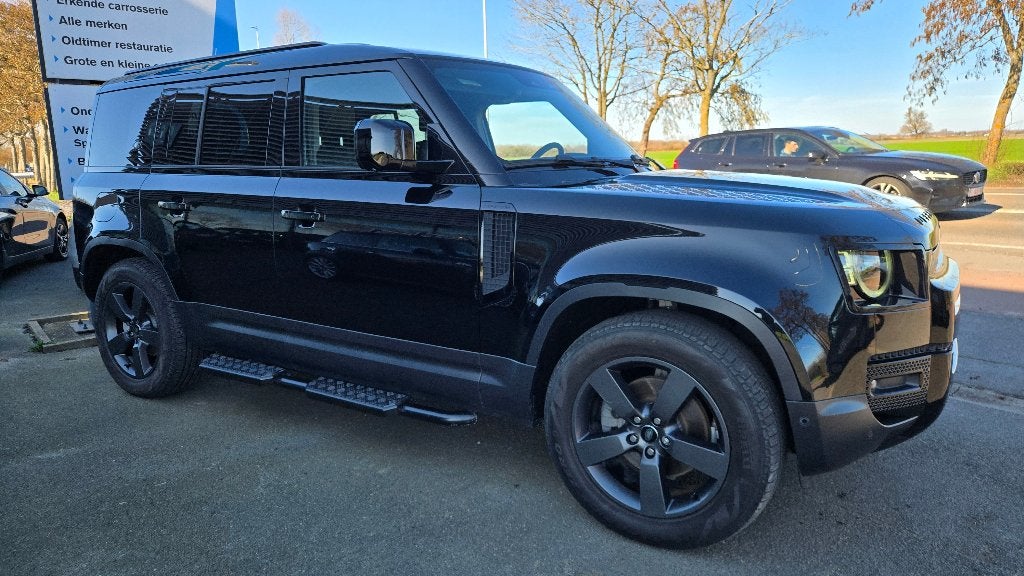 LAND ROVER DEFENDER 110 D200 DE AWD AUTO., Auto's, Land Rover, Automaat, Zwart, Lichtsensor, Zwart