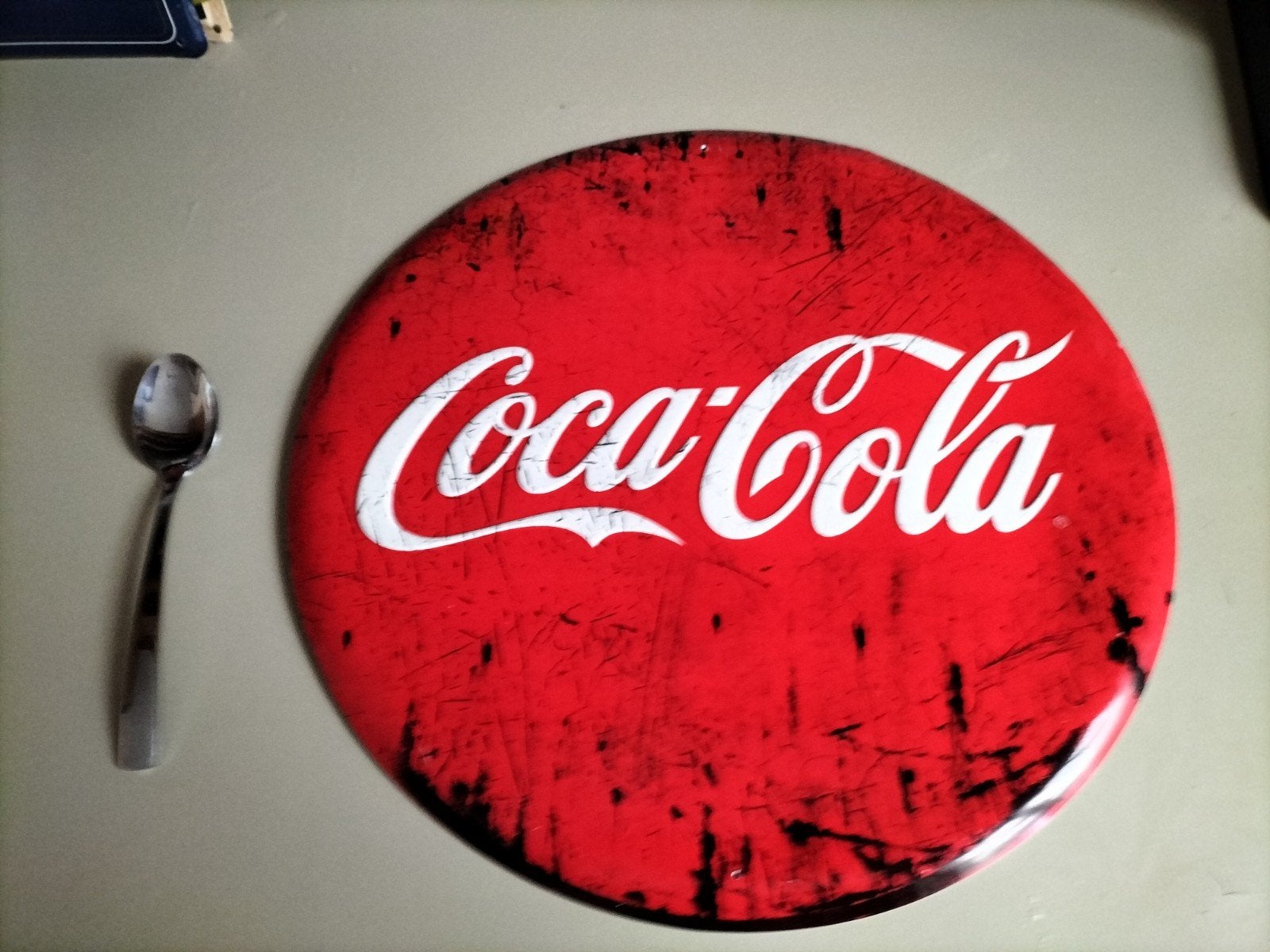 Coca cola reclame bord in metaal, Enlèvement