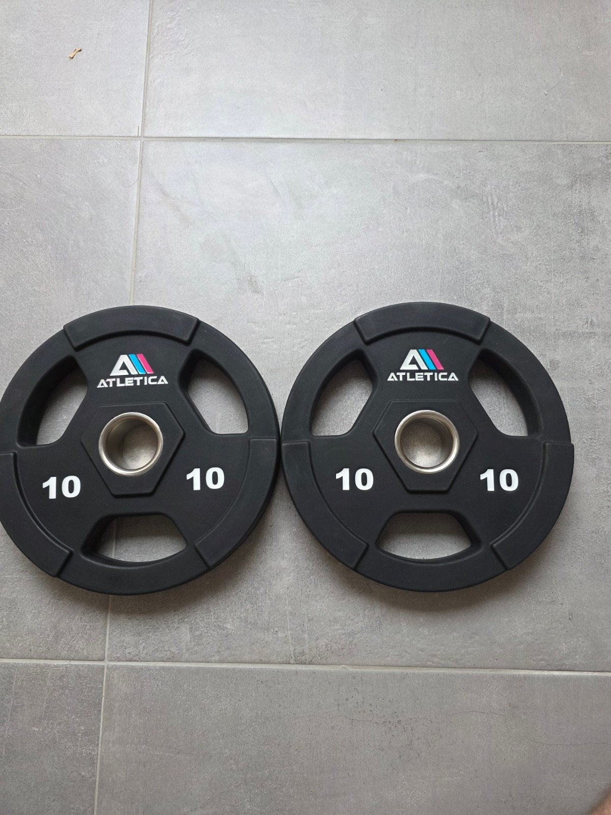 NEGEN ATLETICA-platen 3H 2x10 kg Ø50 mm — Urethaan, Ophalen of Verzenden, Nieuw, Benen, Halterschijven
