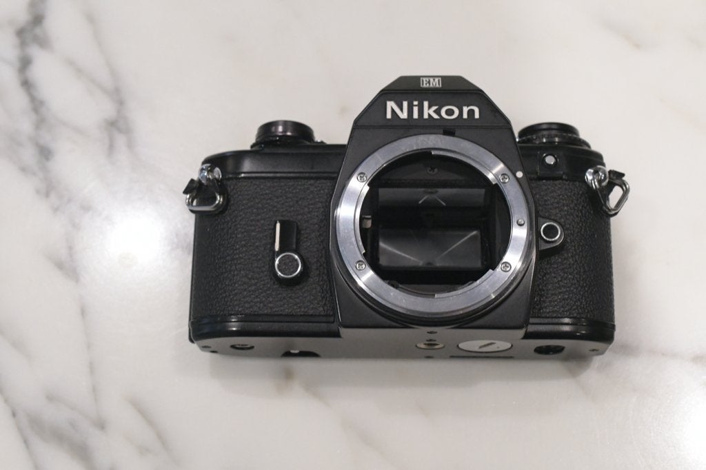 Appareil photo Nikon EM, TV, Hi-fi & Vidéo, Enlèvement ou Envoi, Utilisé, Reflex miroir, Nikon