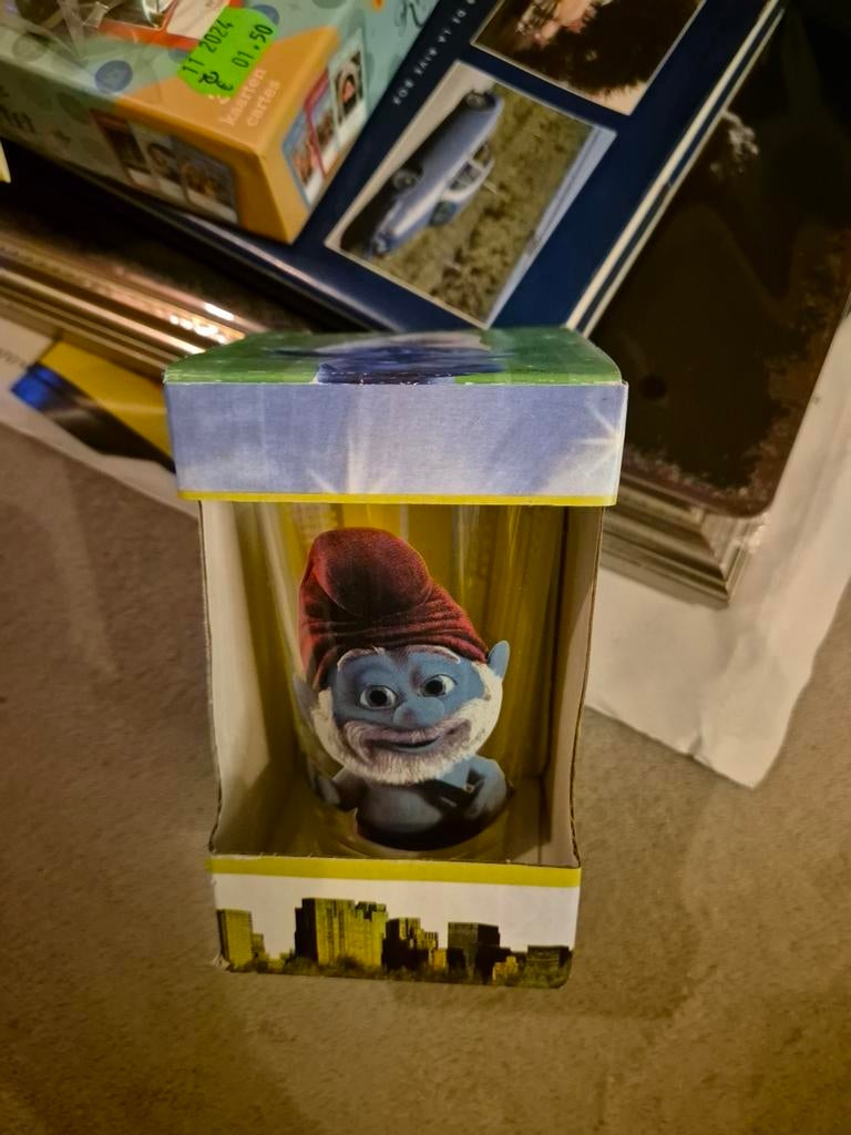 Glas grote smurf, Envoi, Grand Schtroumpf