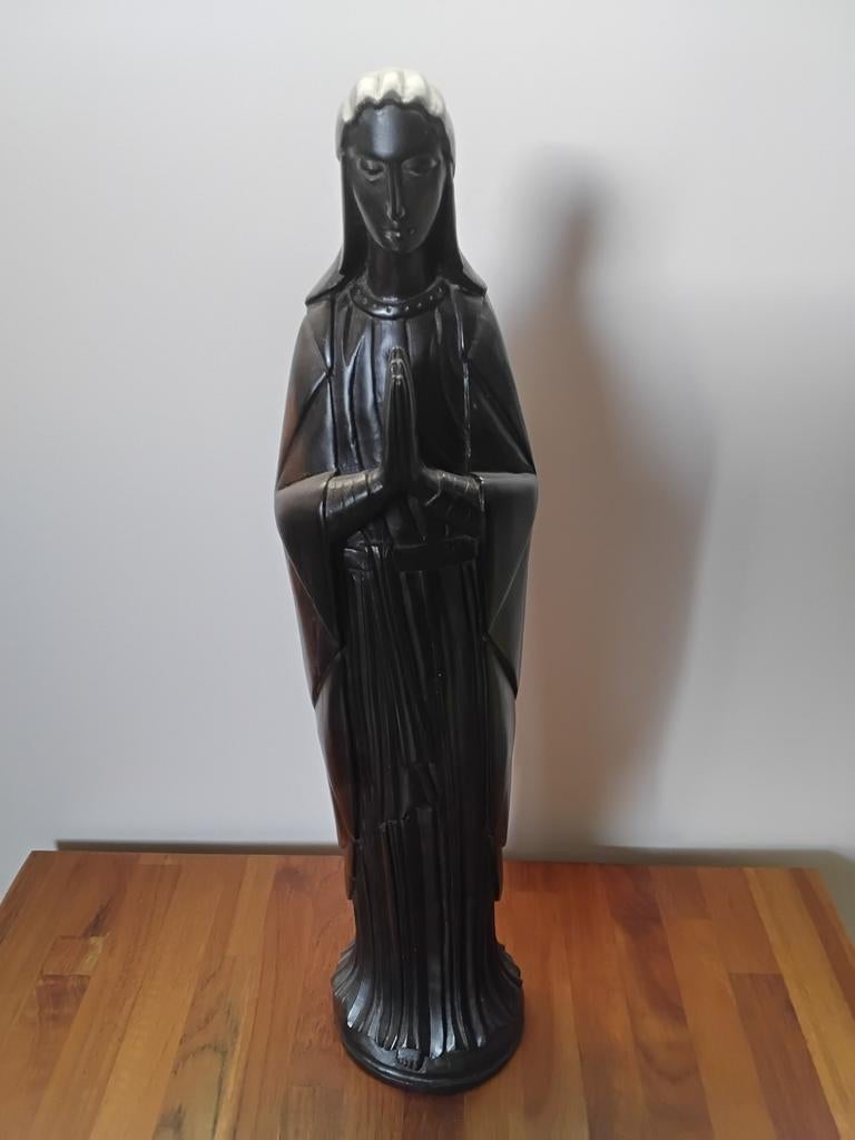 Zwart Maria beeld, Ophalen