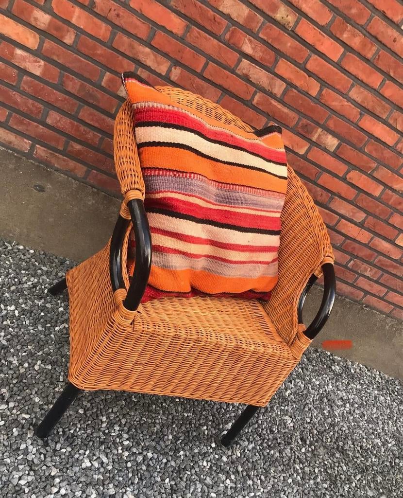 Handgevlochten rotan fauteuil, Ophalen