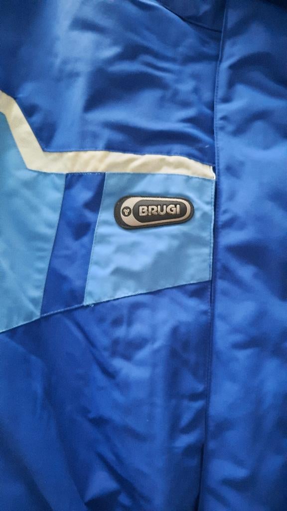 Nieuw Blauw skipak merk Brugi, Sport en Fitness, Skiën en Langlaufen, Nieuw, Kleding, Ski, Ophalen