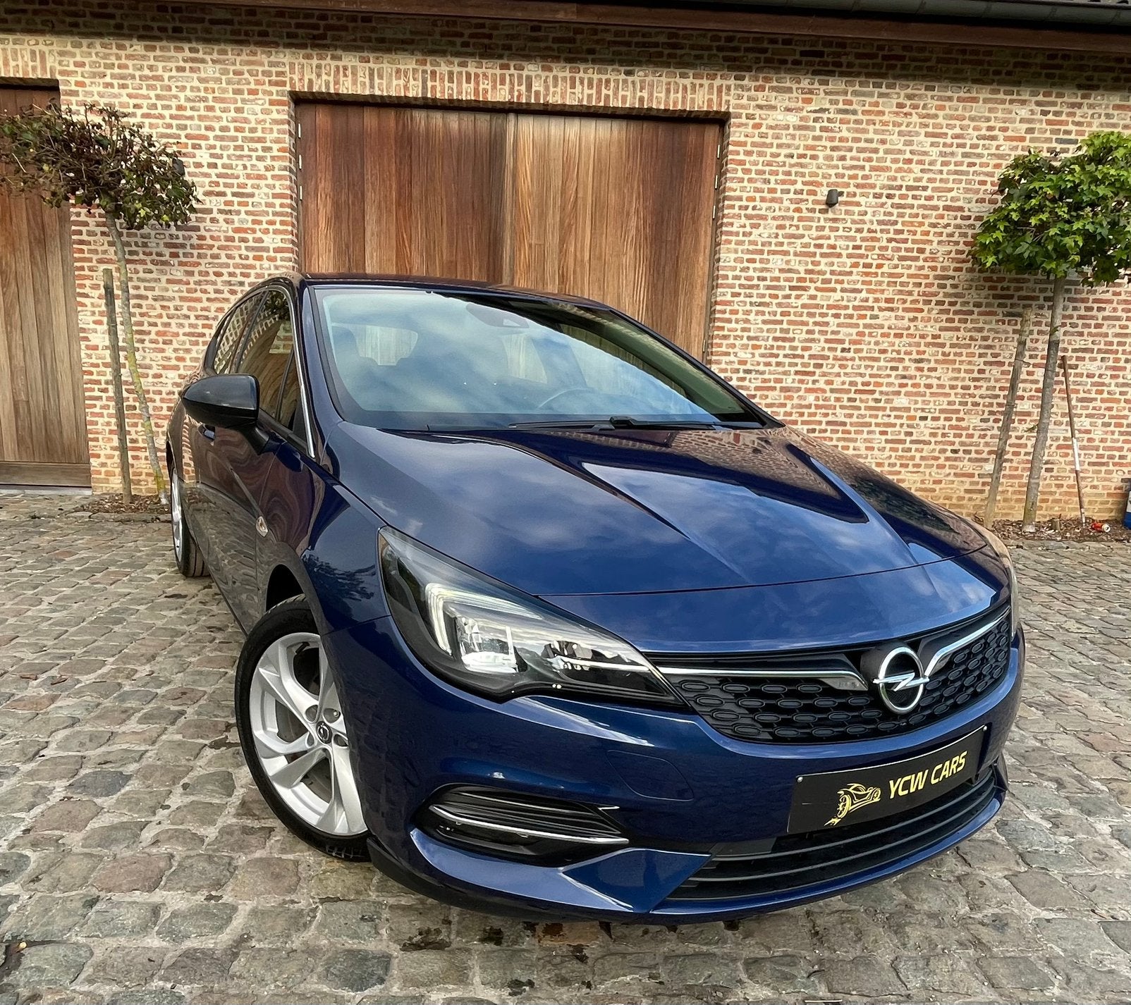 Opel Astra 1.2 Benzine 2021, Auto's, Voorwielaandrijving, Bluetooth, Zwart, Blauw