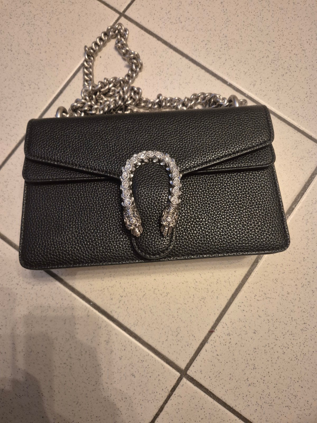 sac GUCCi pour femme, Enlèvement
