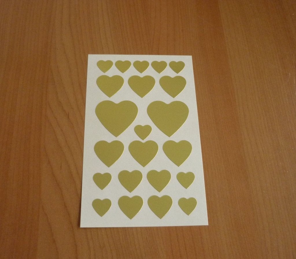 Vel van 22 DIY goudkleurige vlakke metallic hart stickers, Ophalen of Verzenden