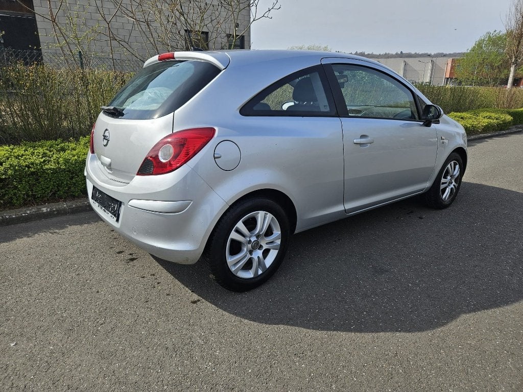Opel Corsa 1.2i  CT OK + AUTOPAS  VOLLEDIG BOEKJE, Voorwielaandrijving, Stof, Elektrische ramen, Zwart