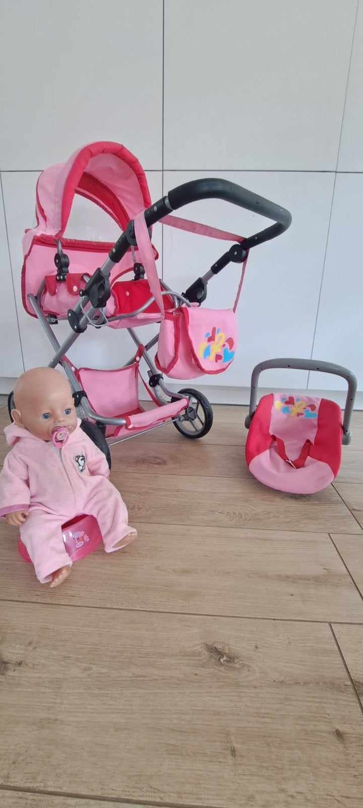 Buggy, maxi cosy, potje en baby born met pakje en tuutje, Ophalen
