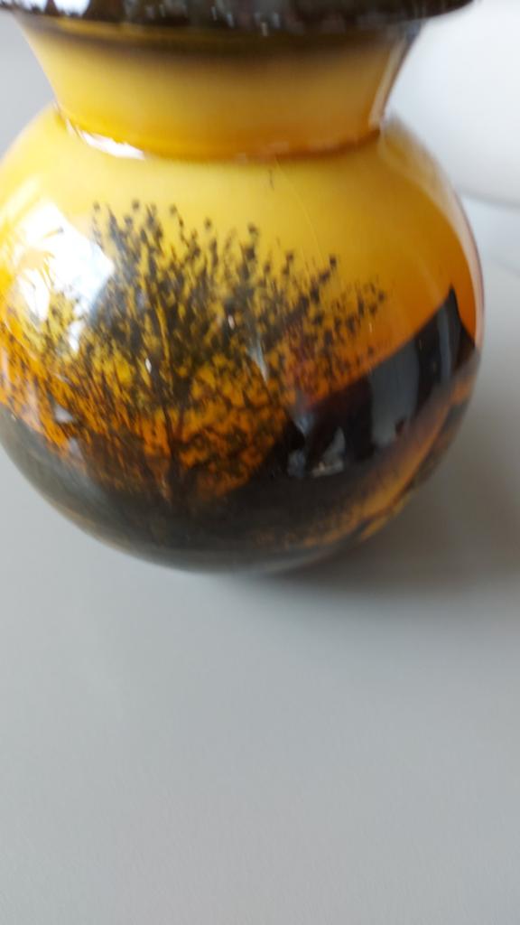Antieke majolica aardewerk vaas, Ophalen