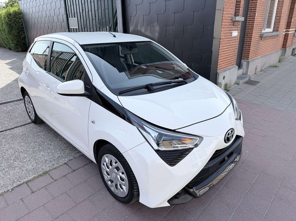 Toyota Aygo 1.0 I EDITION | Carplay | Cruise | Achteruitrijc, Auto's, Toyota, 4 zetels, Stof, Gebruikt, Overige kleuren