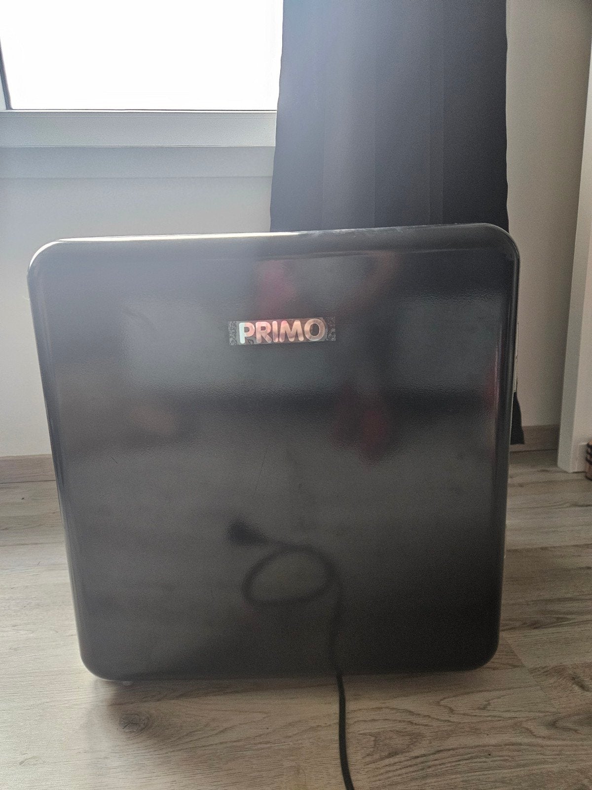 Merk is primo kleur zwart, Ophalen