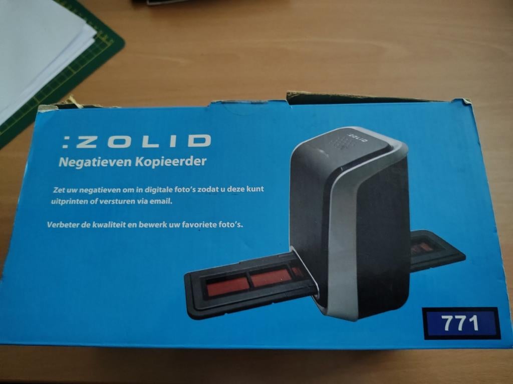Toestel om dia's op te zetten naar digitale foto's, Ophalen