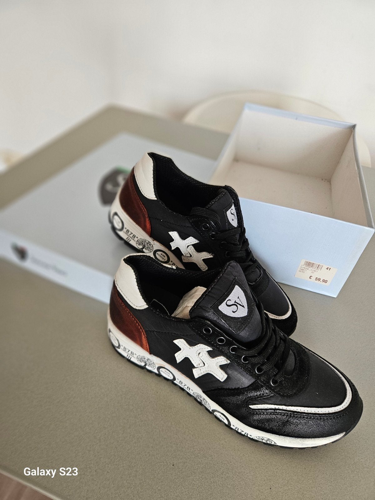 heren schoenen, Enlèvement