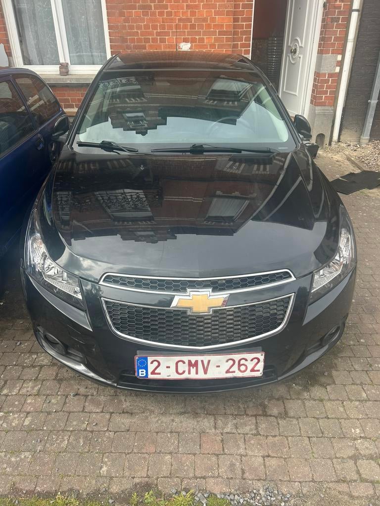 Chevrolet Cruze Hatchback – Zwart – Manueel, Euro 5, Zwart, Cruze, Particulier