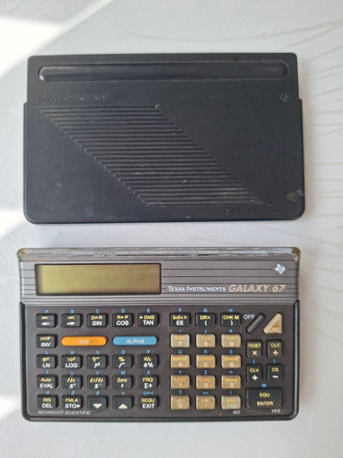Calculatrice Texas Instrument Galaxy 67.  Année 1993, Ophalen of Verzenden
