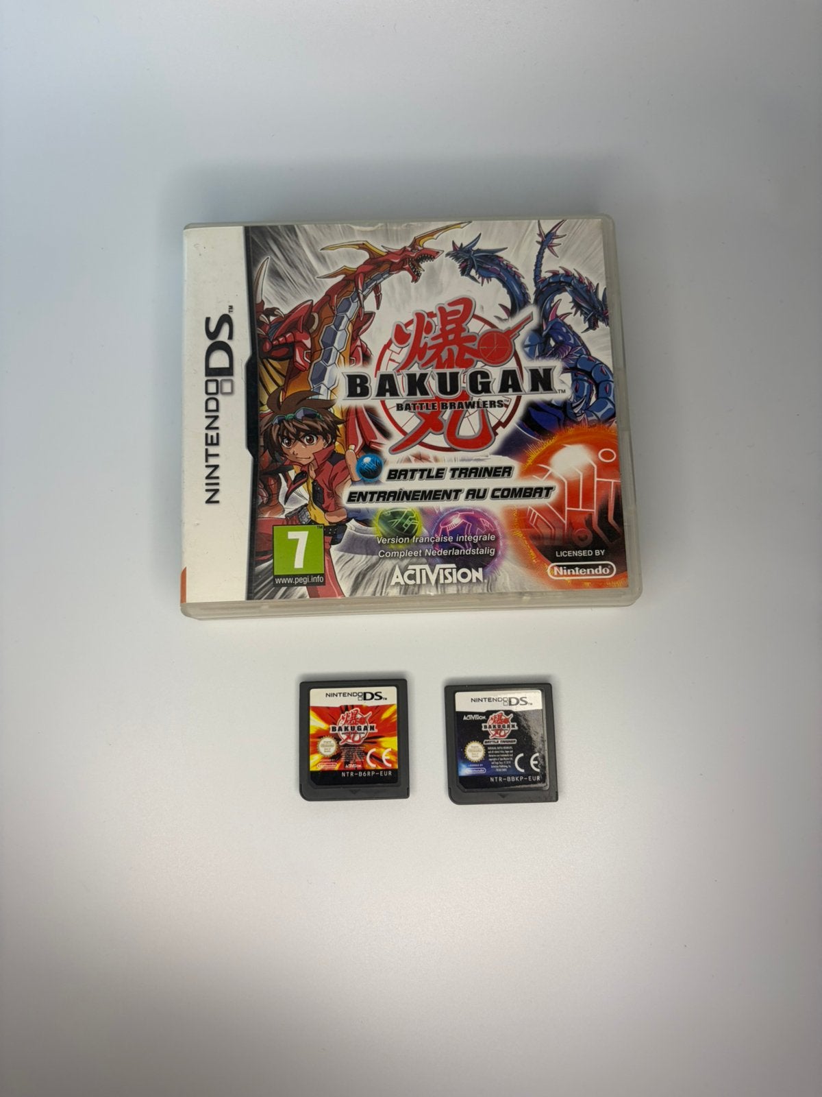 Bundle 2 Bakugan Nintendo DS-spellen (PAL FR), Games en Spelcomputers, Games | Nintendo DS, Gebruikt, Avontuur en Actie, Vanaf 7 jaar