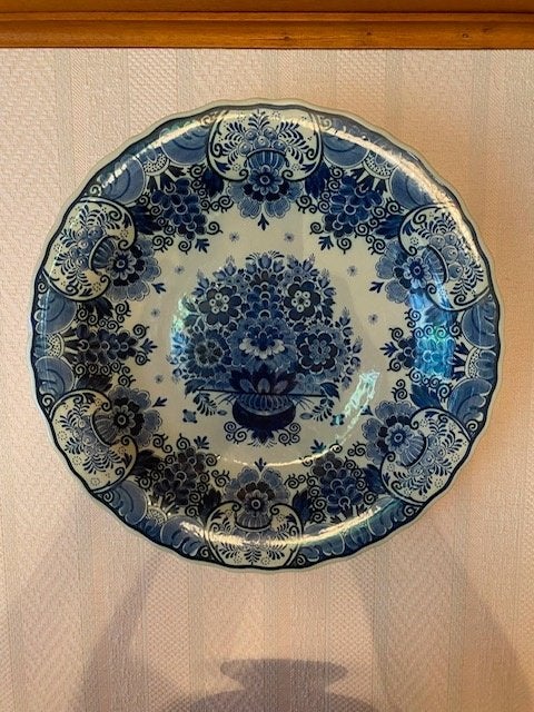 Delfts blauw wandbord, Ophalen