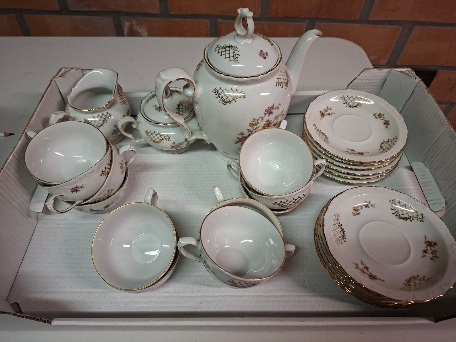 porseleinen servies, Ophalen