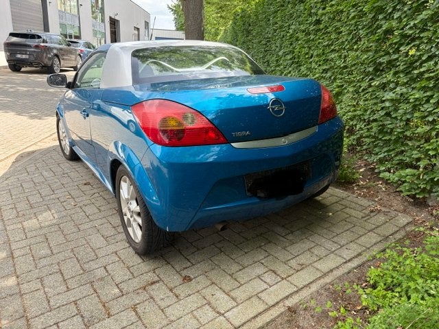 Opel tigra met 45000km., Auto's, Opel, Voorwielaandrijving, Stof, Cabriolet, Blauw