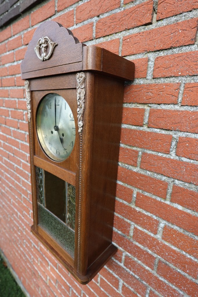antieke bim-bam wandklok, Ophalen