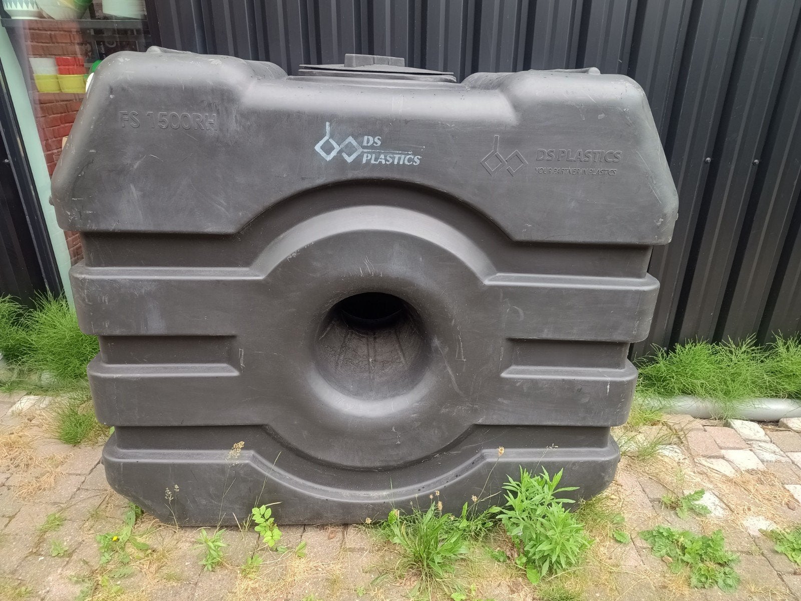 Regentank/septische tank ongebruikt, Ophalen