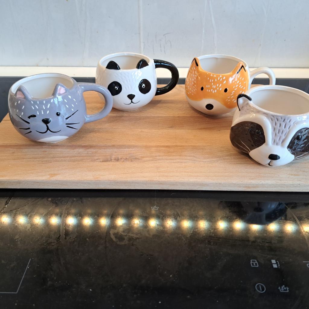 Lot 4 tasses animaux, Enlèvement