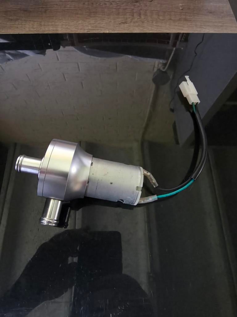 Waterpomp brommer electrisch, Ophalen