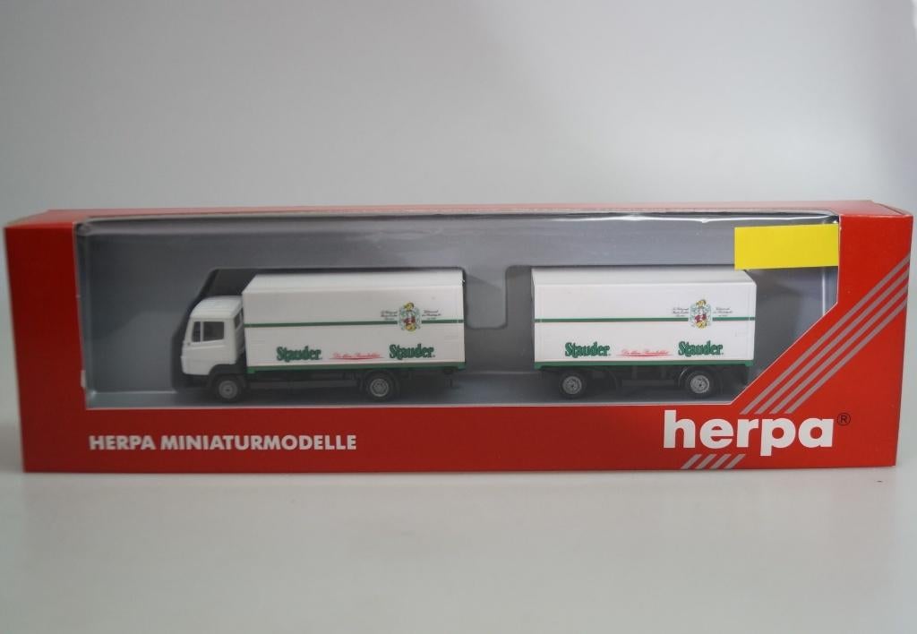 1:87 Herpa 143561 Mercedes Benz 814 Stauder Pils bier, Hobby en Vrije tijd, Modelauto's | 1:87, Zo goed als nieuw, Bus of Vrachtwagen