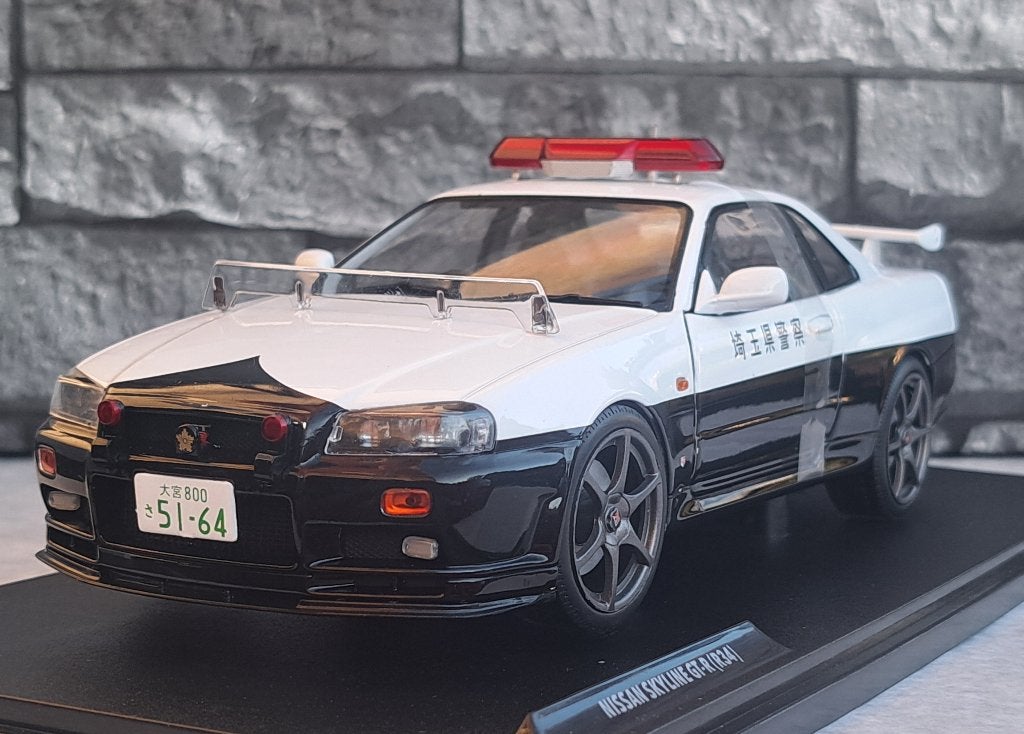 Nissan Skyline GT-R (BNR34) JAPANESE POLICE 1/18ème, Enlèvement ou Envoi, Solido, Voiture, Solido