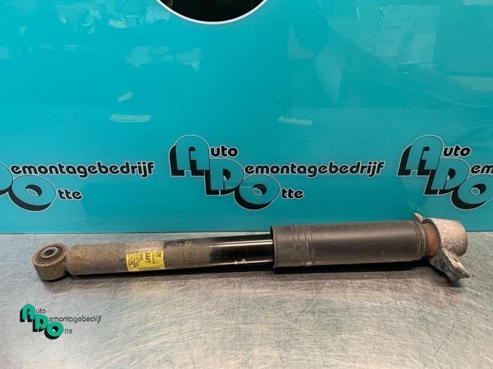 Amortisseur arrière gauche d'un Opel Astra (Astra J 10-), -, Opel, 3 mois de garantie, Utilisé