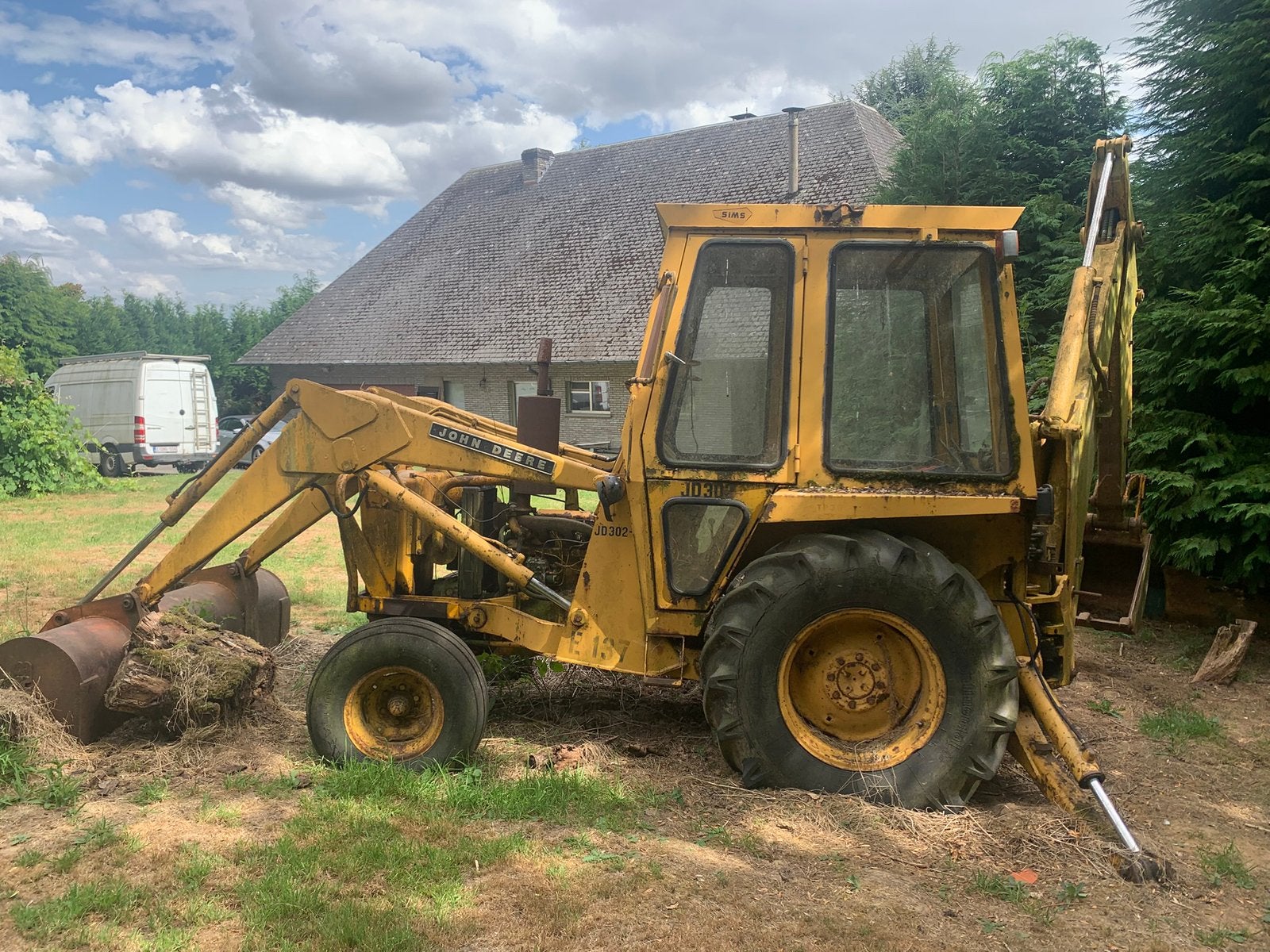 Tractor met kipper en kraan, Ophalen